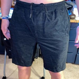 Black and grey Lululemon athletic shorts